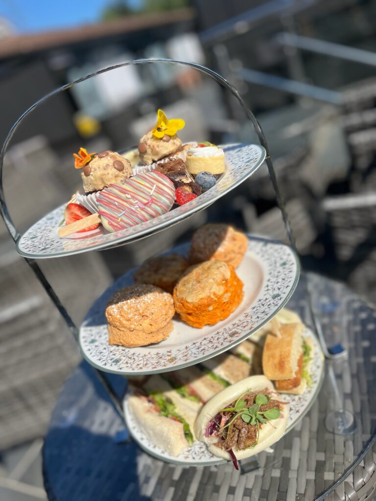 Afternoon tea in Norfolk countryside at Glen Lodge Bawburgh Golf Club with cakes, scones and tea overlooking the Yare Valley