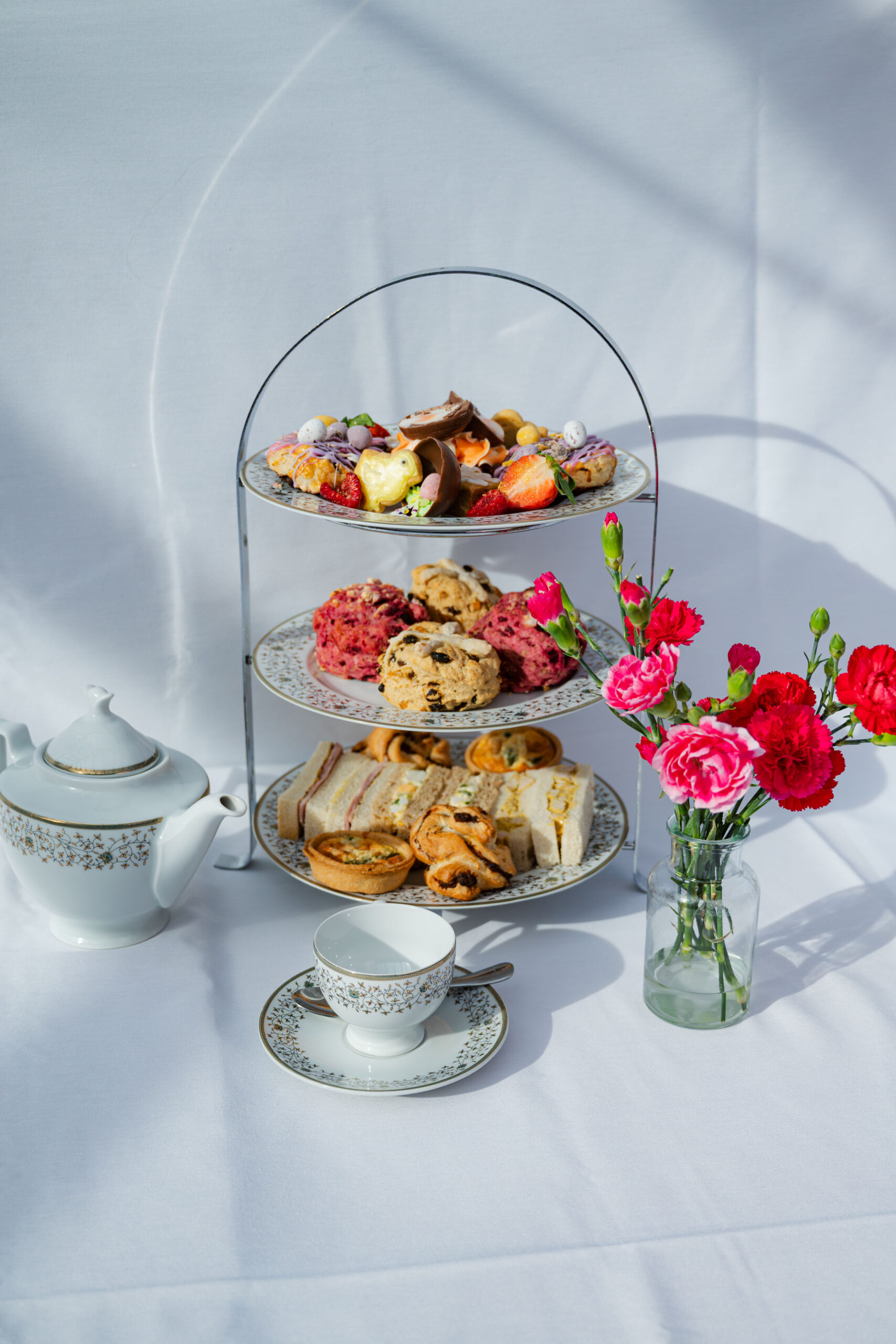 Afternoon Tea near Norwich — classic sandwiches, scones and cakes at Glen Lodge with views across the golf course.
