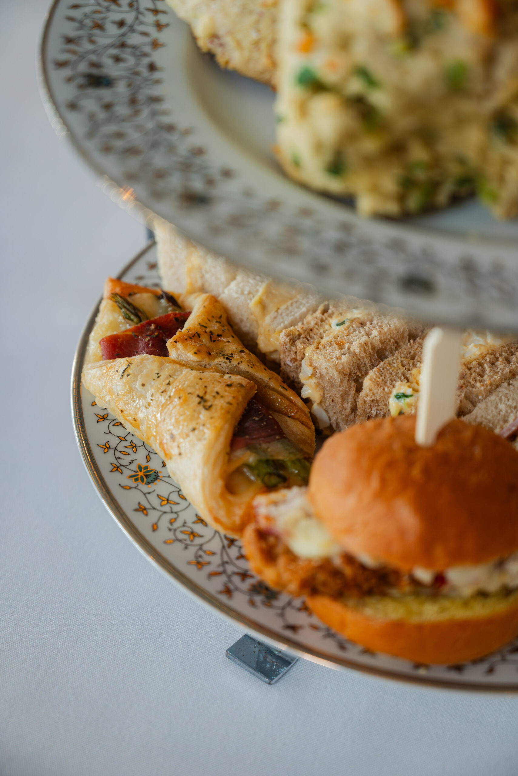 Afternoon Tea near Norwich — classic sandwiches, scones and cakes at Glen Lodge with views across the golf course.