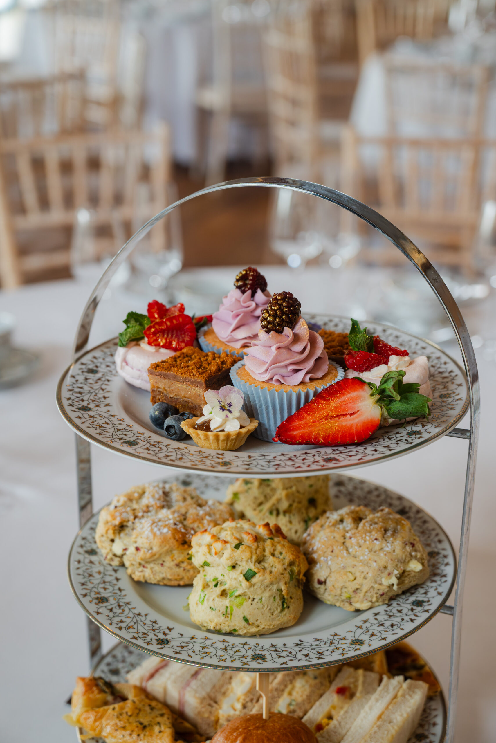 Afternoon Tea near Norwich — classic sandwiches, scones and cakes at Glen Lodge with views across the golf course.