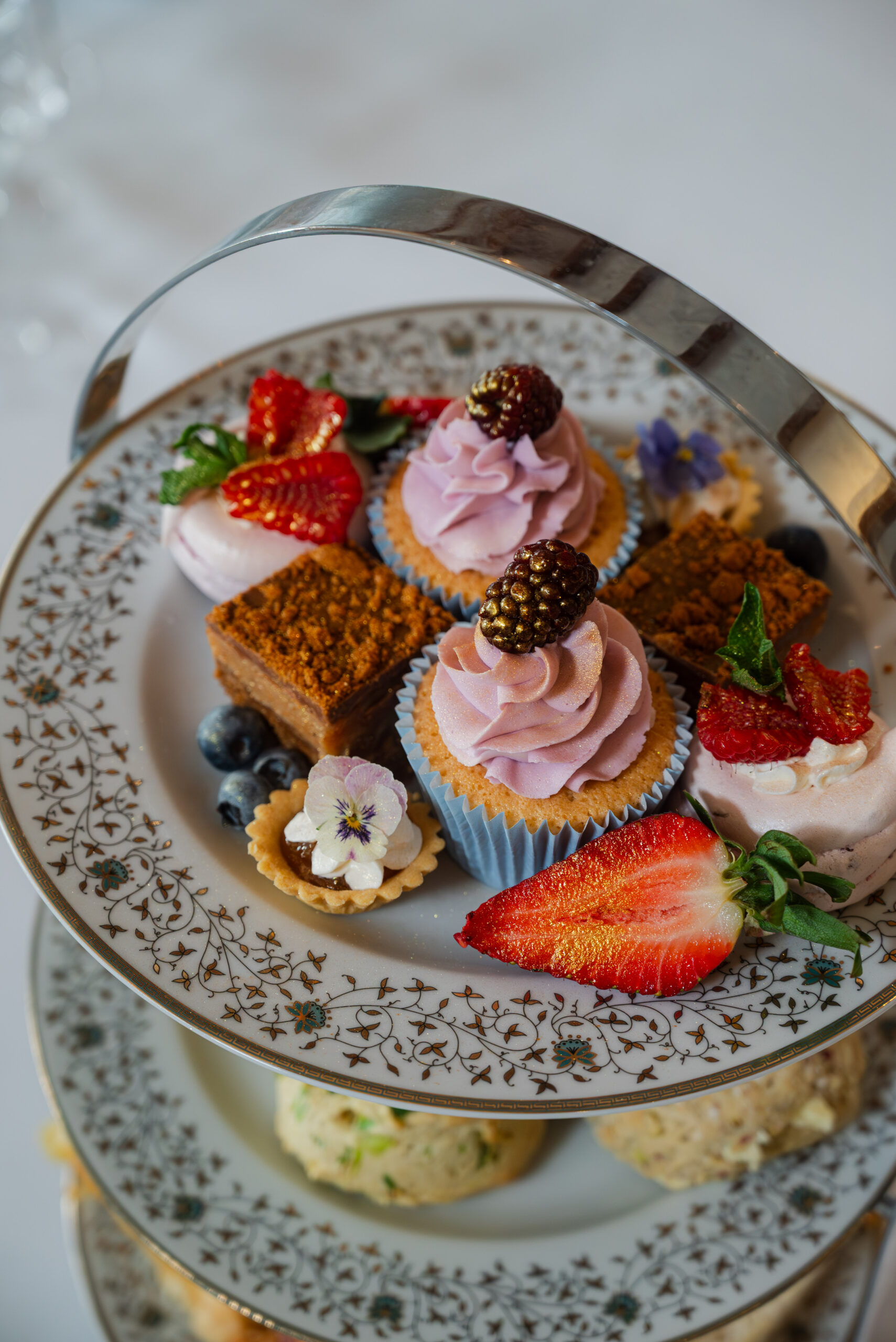 Afternoon Tea near Norwich — classic sandwiches, scones and cakes at Glen Lodge with views across the golf course.