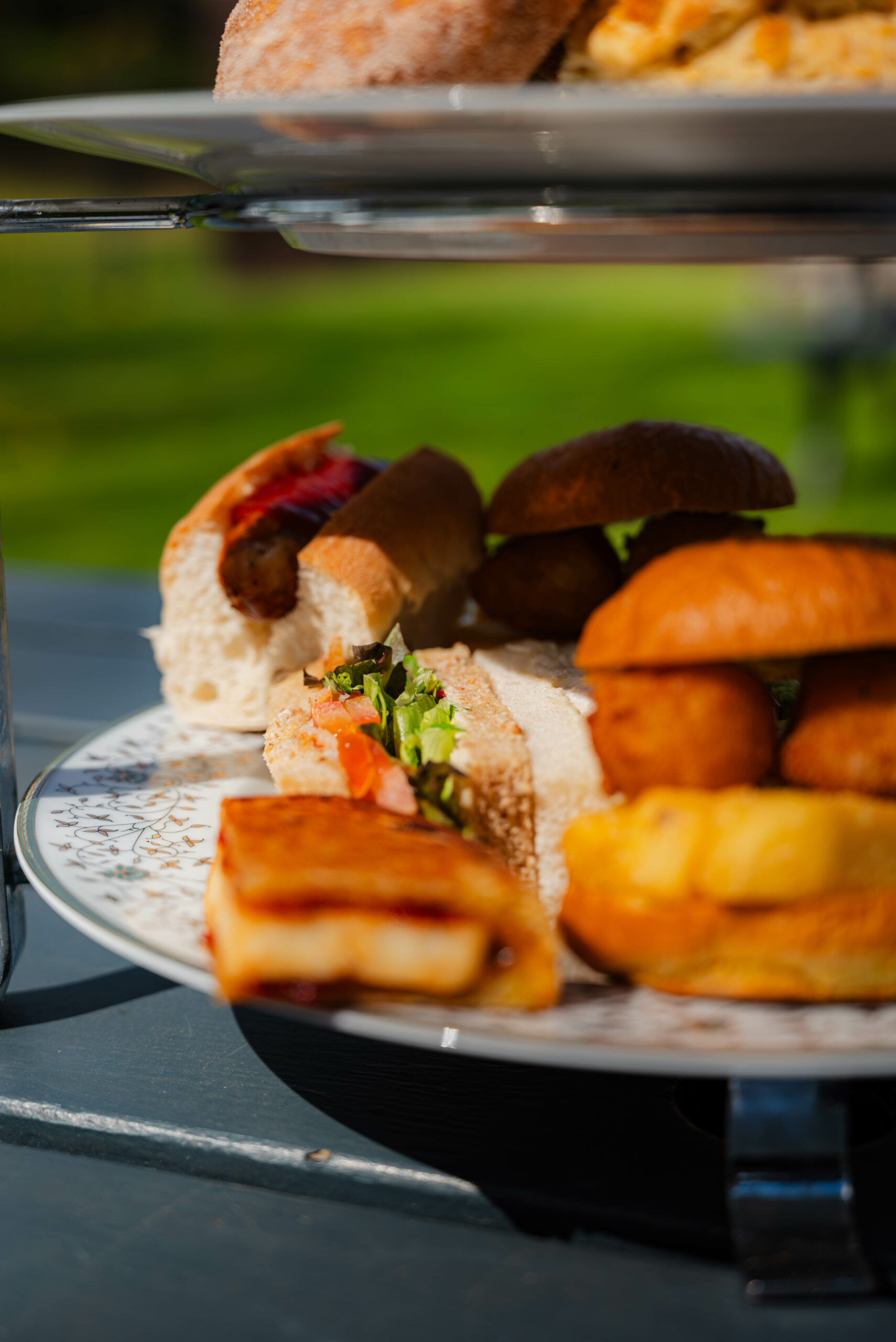 Afternoon Tea near Norwich — classic sandwiches, scones and cakes at Glen Lodge with views across the golf course.