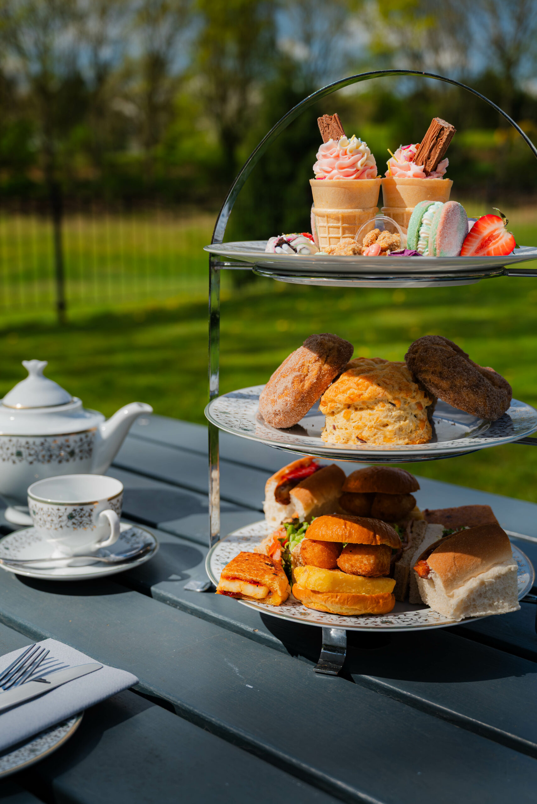 Afternoon Tea near Norwich — classic sandwiches, scones and cakes at Glen Lodge with views across the golf course.